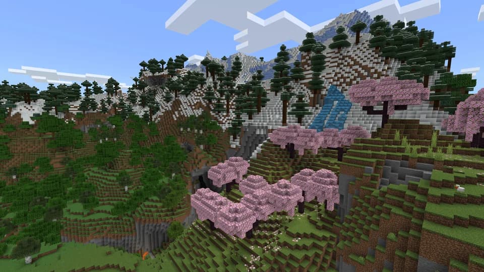 Minecraft landscape with forested mountains and cherry trees